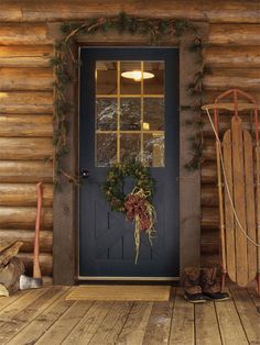 Rustic Cabin Christmas Door Photography Backdrop - Rustic Christmas photography backdrop featuring a cozy cabin door with a festive wreath and vintage sled for holiday photoshoots. Log Cabin Door, Log Cabin Christmas Decor, Rustic Cabin Exterior, Cabin Front Door, Cabin Christmas Decor, Log Cabin Christmas, Rustic Front Door, Cabin Door, Cabin Doors