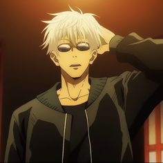 an anime character with white hair and glasses in front of a red door wearing a black hoodie