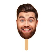 a man with a beard and mustache is holding a popsicle in front of his face