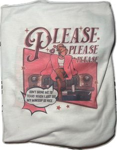 a t - shirt with an image of a woman sitting on top of a car