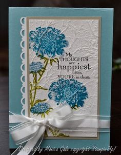 a card with some blue flowers on it