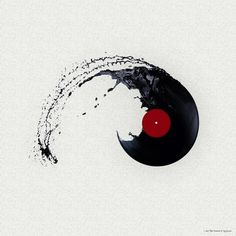 an old vinyl record with water splashing out of the top and red disc in the middle