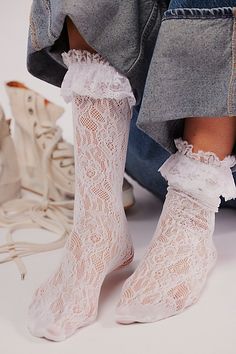 Just as effortless as they are essential, these so cool socks are featured in a mid-calf rise and sheer lace fabrication with ruffled top trim for a special finishing touch. **Features:** Sheer mesh lace fabrication, defined rifle detail at top, scrunch-able style **Why We ❤ It:** The ideal blend of sweet and sultry, these go-with-anything socks are sure to make the perfect subtle touch when paired with absolutely any style. | Embrace Lace Tall Socks by Free People in White Tulle Socks And Heels, Frilly Socks And Heels, Fairy Socks, White Lace Socks, Loose Socks, Tulle Socks, Trilogy Tour, Ruffle Socks, Pretty Clothing