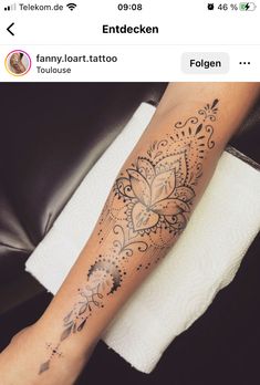 a person with a tattoo on their arm