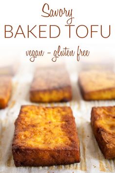 baked tofu on a baking sheet with text overlay that reads savory baked tofu vegan - gluten free