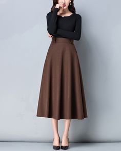 * A high-end long wool skirt with wide hem, very cool. * Made of wool blends, fully lined and with two side pockets. * Fixed waist with wide waistband and side invisible zipper. * Can custom make waist size and skirt length. * Material: Outer-50% wool, 50% polyester; lining-100% polyester * Washing instructions: Dry Clean Only * Size: True to US size, US 0-US 20 are available, you can let us know your usual size and height in your order. * Shipping: Free shipping Processing time : 5-7 Business d Midi Rock Outfit, Long Skirt Vintage, A Line Skirt Outfits, Midi Skirt Winter, Long Wool Skirt, Dark Grey Skirt, Skirt Winter, Oliver Wood, Skirt Ideas