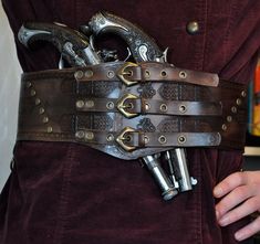 A belt, perfect for cosplay. Viking or pirate style. Belt has 2 metal rings to hang additional equipment. Pistols are not included. Size: Standard Length:  From 87,5 cm  (34,45 inches) to 97,5 cm (38,39 inches) - can be customized Width: - narrowest: 10,1 cm (3,98 inches) - widest: 13,3 cm (5,24 inches) Skin thickness: 3 mm (0,12 inches) - 4 mm (0.15 inches)  I can customize the size of the belt. If you want to, please select the "CUSTOM SIZE" option and write me your belly/waist circuit in the Warlock Costume, Pirate Fashion, Fantasy Style, Larp Costume, Utility Belt, Costume Cosplay, Suspender Belt, Larp, Hand Forged