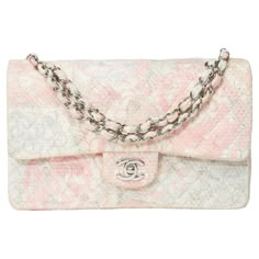 Amazing​ ​&​ ​Rare​ ​Chanel​ ​Timeless​ ​Camellia​ ​limited​ ​edition​ ​double​ ​flap​ ​shoulder​ ​bag​ ​in​ ​multicoloured​ ​quilted​ ​Tweed​ ​(pastel​ ​colors​ ​pink,​ ​gray,​ ​ivory),​ ​silver​ ​metal​ ​trim,​ ​silver​ ​metal​ ​handle​ ​interlaced​ ​with​ ​multicolor​ ​Tweed​ ​allowing​ ​a​ ​hand​ ​or​ ​shoulder​ ​or​ ​crossbody​ ​carry 1​ ​patch​ ​pocket​ ​on​ ​the​ ​back​ ​of​ ​the​ ​bag Padded​ ​flap​ ​closure,​ ​​ ​silver​ ​metal​ ​CC​ ​closure Pink​ ​leather​ ​inner​ ​lining,​ ​a​ ​doubl Pink Chanel Bag, Limited Edition Bag, Chanel Pink, Flap Shoulder Bag, Chanel Purse, Pink Chanel, Fancy Bags, Pretty Bags, Cute Bags