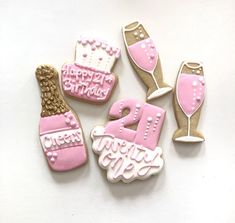 decorated cookies with pink and white frosting for a 21st birthday