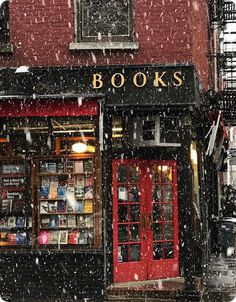 a book store in the snow on a city street