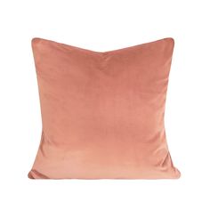 a pink pillow on a white background