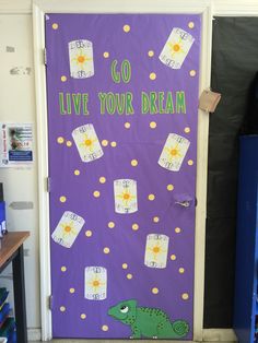 a door decorated with purple paper and yellow polka dots that says go live your dream