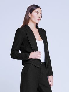 A polished open-front jacket in black linen. Sartorial details include strong shoulders and peaked lapels. Seaming tapers style to waist, creating a feminine silhouette. Finished with tonal embossed-dome accent buttons. No closures. 100% Linen. Structured Black Blazer, Black Structured Blazer, Seersucker Jacket, Black Core, Strong Shoulders, Open Front Jacket, Kids Denim, Feminine Silhouette, Elegant Chic