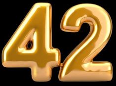 the number 42 is made out of shiny gold foil and sits in front of a black background