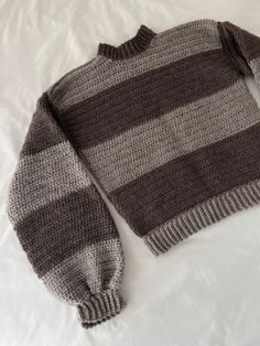 light gray & dark gray striped crochet mock neck sweater - soft, cozy, and handmade out super warm wool Handmade with 100% wool yarn. With simple care, this beautiful sweater can last a lifetime. Handwash is recommended. Etcetera Gray Sweaters, Striped Crochet Sweater, October Aesthetic, Gray Knit Sweater, Crochet Pieces, Sweater Handmade, Crochet Jumper, Light Grey Sweater, Grey Knit Sweater