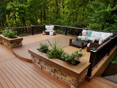 a wooden deck with planters on it