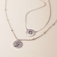 The perfect personalized gift for anyone - engrave your own initial, or gift a loved one's initial. It's perfect as a birthday, friendship, mother's day and bridesmaids gift. This pendant necklace features a small classic round disc on a delicate, diamond-cut cable chain from our signature O Collection. Disc diameter 0.4in (1cm) Adjustable chain: 15-17in (38-43cm) Laser Engraving Letter Height: 3mm Sterling Silver Spring clasp closure Hypoallergenic, lead and nickel free #256S Initial Disc Necklace, Disc Necklace, Severe Weather, Silver Spring, Diamond Cut, Cable Chain, Bridesmaid Gifts, Laser Engraving, Mother's Day