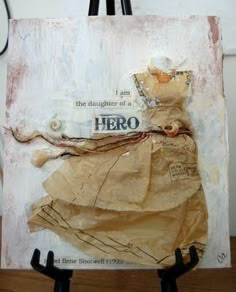 a piece of art that has been altered to look like a paper bag with the words hero on it