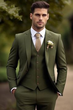 a man in a green suit and tie