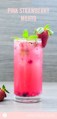 pink strawberry mojito with mint garnish on the rim