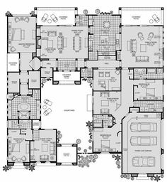 the floor plan for an apartment with multiple rooms and two car garages on each side