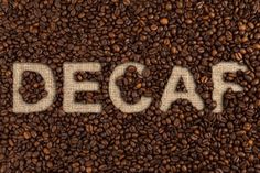 coffee beans with the word decaf written on them