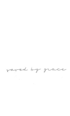 a black and white photo with the words saved by grace written in cursive writing