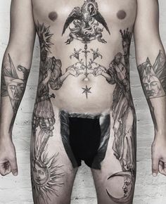 a man with many tattoos on his body