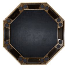 a black and gold plate with circles around it