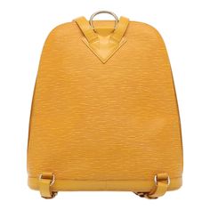 Brand: Louis Vuitton Model: Gobelins Color: Yellow Material: Leather Inclusions: / Dimensions: W31cm x H34cm x D14cm Serial number: VI1905 Country of origin: France Condition: AB - good condition. This Louis Vuitton Gobelins backpack in vibrant yellow Epi leather, made in France, combines functionality with a bold aesthetic. Its sturdy design features a distinct color and practical shoulder straps, ideal for daily use. The exterior shows some loss of shape and slight rubbing on the corners. The Gold Luxury Backpack, Elegant Formal Backpack With Gold-tone Hardware, Luxury Leather Travel Backpack With Gold-tone Hardware, Luxury Leather Backpack With Gold-tone Hardware For Travel, Luxury Leather Backpack For Travel With Gold-tone Hardware, Luxury Backpack With Gold-tone Hardware For Everyday Use, Luxury Backpack With Gold-tone Hardware For Formal Occasions, Classic Formal Backpack With Dust Bag, Luxury Leather Backpack With Detachable Strap For School