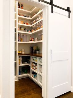 an open pantry with lots of food in it