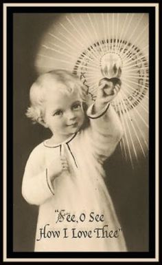 a black and white photo of a baby holding an apple with the words, see o see how i love thee