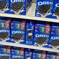 oreo cookies are stacked on top of each other in a store display case for sale