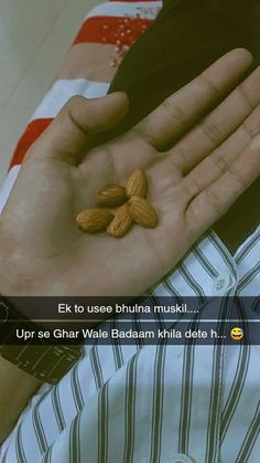 a person holding almonds in their hands with the caption, e k to use bhunna musk