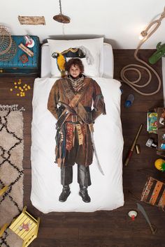 a bed that has a pirate on it