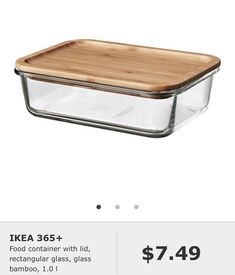 a glass casserole dish with a wooden cutting board on the side for $ 7 99