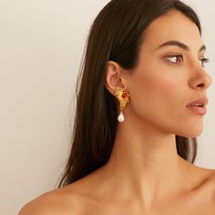 Dive into a world of coastal elegance with our Reef earrings, crafted using real Costa Rican coral as inspiration, these earrings embody the intricate beauty of a sea reef, featuring 24K gold-plated metal with coral red resin. Delicate pearls adorn the bottom of each earring. With a comfortable clip-on backing, these earrings ensure a secure and comfortable fit. All jewelry is handcrafted and made to order in our New York City design studio. Please allow 7-14 business days for production from the order date. Measurements: 1 3/4" L Elegant Coral Jewelry With Pearl Drop, Elegant Coral Earrings For Formal Occasion, Elegant Coral Drop Earrings, Beachy Necklace, Coastal Elegance, Costa Rican, Summer Earrings, Summer Earring, Coral Red