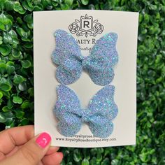 "Spring Blue Glitter Butterfly Hair Bow for Easter Basket stuffers.  These butterfly hair bow accessories make a beautiful and fun addition to any Spring, Easter and everyday outfit. The bow clips are perfect for any age and make a wonderful gift for birthdays, stocking stuffers, smash cake photo shoots, new babies, special occasion, party favors and fun everyday wear. Available in 1 size: -Medium 3\" Pigtail set Hair Bows, attached to an alligator clip with teeth All items come attached to a bo Butterfly Hair Bow, Spring Hair Accessories, Spring Hair Bows, Pigtail Bows, Glitter Butterfly, Shampoo Hair, Accessories Blue, Butterfly Party, Spring Accessories