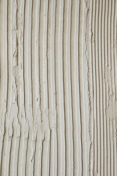 the texture of wood is white and has been painted with light brown paint on it