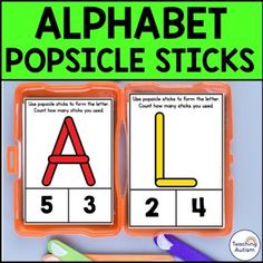 the alphabet popsicle sticks are in plastic containers with numbers and letters to match them