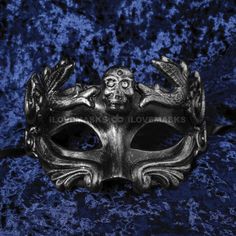 This Silver Halloween Roman Eye Mask Is Made From Rubber. Decorated With Skull Face With Rhinestone In The Eyes. The Mask Is About 9" Tall And 6" Wide. The Masquerade Mask Will Make A Great Costume Accessory. Great For A Halloween Event, Masquerade Ball, Venetian Costume The Mask Is Approximately 4" Tall And 6" Wide May Also Be Used As A Display Piece Hand-Painted With An Aged Finish Built-In 2 Ribbon Tie Color: Silver Usm-M3212-Bksv Fire Mask Design, Men Masquerade Mask, Grey Masquerade Mask, Skull Masquerade Mask, Masquerade Mask Men, Ballroom Extravaganza, Masquarade Mask, Pirate Mask, Masquerade Men