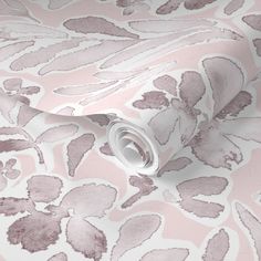 a pink and white wallpaper with an animal print pattern on it's surface