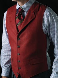 Red Flannel Waistcoat - © The Ben Silver Corporation  Red lightweight wool flannel waistcoat cut from Super 120’s flannel from Barberis in Italy. Notched collar lapel, side flap pockets, and 6 buttons (only buttons 5), in sizes 40-48 Regular. Semi-formal Button Vest For Fall, Formal Red Vest For Fall, Single Breasted Semi-formal Winter Vest, Single-breasted Semi-formal Winter Vest, Winter Semi-formal Single Breasted Vest, Classic Tailored Vest For Fall, Elegant Single Breasted Winter Vest, Formal Notch Lapel Vest For Winter, Classic Red Vest For Fall