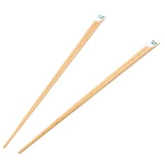 two wooden chopsticks on a white background