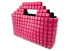 a pink bag made out of keyboard keys