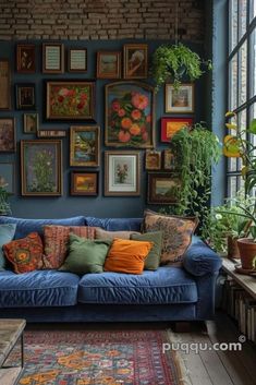 a living room filled with furniture and lots of pictures hanging on the wall above it