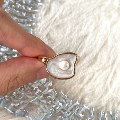 Stunning real natural freshwater pearl and shell statement cocktail chunky ring, open adjustable ring. White shell signet with natural pearl paved in the center, 14k rose gold plated finish. Super unique and creative, elevate your dainty vibes, easy to stacking. Perfect gift to treat yourself and your friends/family, you will get lots of compliments for sure! ♥ All of our jewelry are carefully handmade with delicate and exquisite details, all designed and made in Manhattan, New York. 💎 Features Adjustable Rose Gold Open Pearl Ring, Rose Gold Open Pearl Ring, Mother Of Pearl Ring, Chunky Ring, Shell Ring, Chunky Rings, Natural Pearl, Tahitian Pearls, Jewelry Inspo