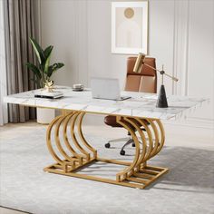 an office desk with a marble top and gold metal legs, in a white room