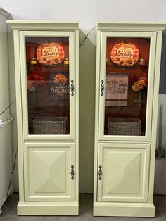 two display cabinets with pumpkins on them