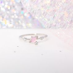 Need some space? Then this is the ring for you! Our I Need Space Ring features a Girls Crew signature pink gem that is so flirty and feminine. 18k gold plated, 18k rose gold plated, or rhodium plated over brass with a protective coating Cubic zirconia stones Available in sizes 6-8 5mm width Shop our entire GC Galaxy Collection here! Pink Cute Rings For Anniversary, Adjustable Pink Rings For Proposal, Pink Dainty Crystal Ring For Anniversary, Dainty Pink Crystal Ring For Anniversary, Dainty Pink Crystal Anniversary Ring, Cute Pink Round Rings, Cute Pink Rings For Promise, Dainty Pink Crystal Ring For Wedding, Dainty Pink Crystal Ring